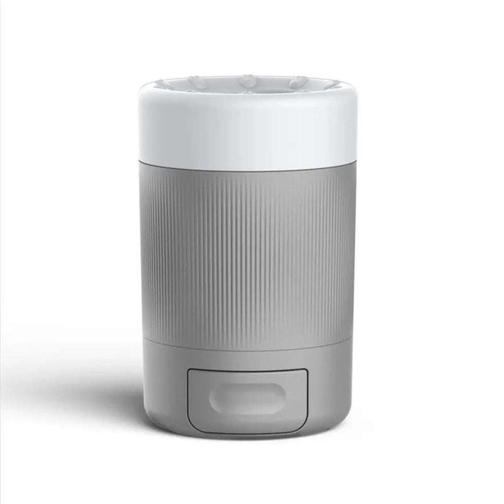 Gray dog paw cleaner cup for muddy paws with white cleaning opening