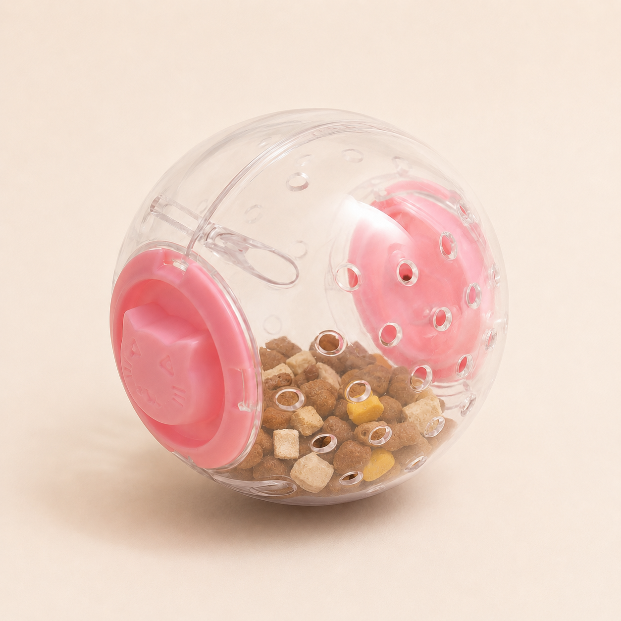 Pink interactive pet treat tumbler toy with mixed treat pieces